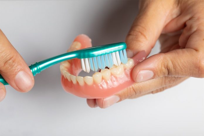 What kind of cleaner is best for dentures and partials?